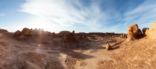 Fotobehang Diepbruin Red Rock Formations in Desert at Sunny Sunrise. Spring Season. Goblin Valley State Park. Utah, United States. Nature Background Panorama  © edb3_16