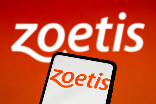 August 16, 2022, Brazil. In this photo illustration, the Zoetis logo is displayed on a smartphone screen and in the background.
