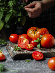 person cutting vegetables