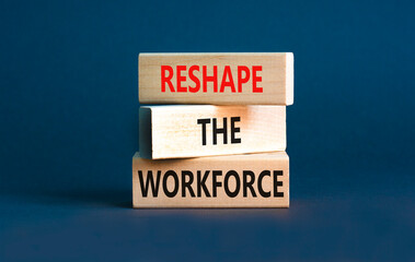 Reshape the workforce and support symbol. Concept words Reshape the workforce on wooden blocks. Beautiful grey table grey background. Business reshape the workforce quote concept. Copy space