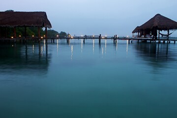Cloudy and cool sunrise on the dock of the lagoon of bacalar Mexico