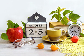  Calendar for October 25: a decorative house with the numbers 25, the name of the month October in...