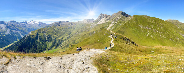 Panoramic view of a hiking trail through the Austrian Alps in the high mountains of the Zillertal...