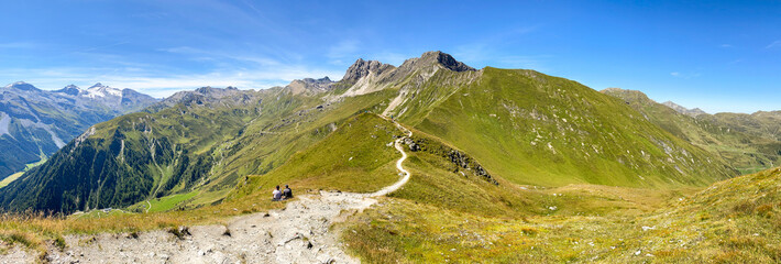 Panoramic view of a hiking trail through the Austrian Alps in the high mountains of the Zillertal near the Tux Glacier in summer, Tirol Austria Europe - 523873349