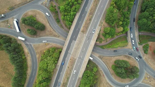 High Angle View of Roads and Caldecotte Lake of Milton Keynes England UK. Footage Taken in a Morning of Summer.
