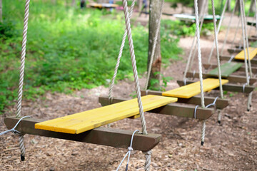 Fototapeta premium Rope park, obstacle course in the amusement park