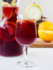 Misted glass of sangria, a slice of lemon