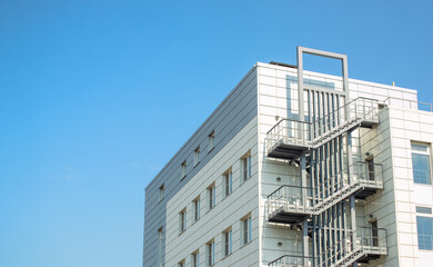 Architectural details of a modern office building. Modern European complex. against the sky.