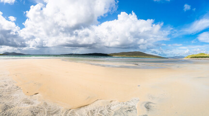 Wide panoramic view of Luskentyre Sands beach on the Isle of Harris, Scotland, UK