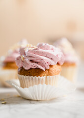cupcakes with whipped butter cream blackberry strawberry lemon cake