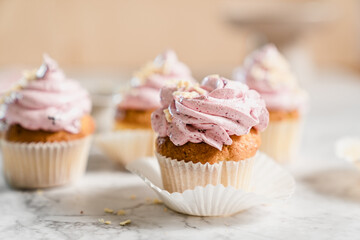 cupcakes with whipped butter cream blackberry strawberry lemon cake