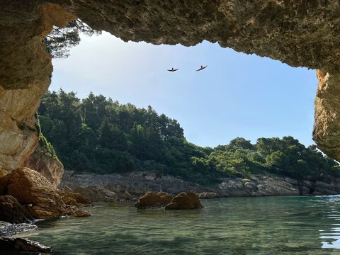 Beautiful sea bay among scenic rocks. Serenity. Solitude. Amazing nature of Mediterranean coast at summer.