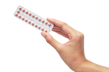 hand holding Oral contraceptive pill isolated on white background - obrazy, fototapety, plakaty