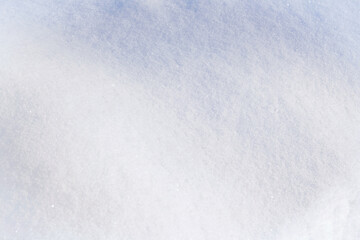 Winter snow. Snow texture Top view of the snow. Texture for design. Snowy white texture. Snowflakes.