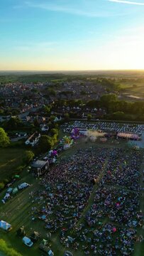 Vertical aerial view of a live music festival