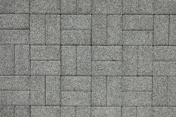 decorative tiles for the sidewalk. in the photo, a sidewalk tile in close-up