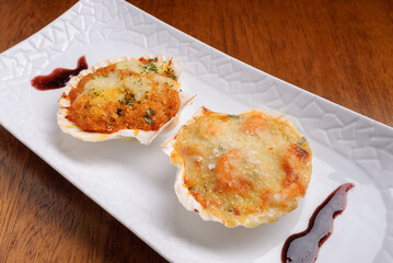 Crab and shrimp served in a shell, also known as Casquinha or crab cone. Brazilian seafood.