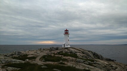Peggy's Cove lighthouse in Canada on a cloudy day