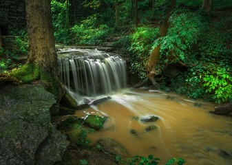 Small waterfall with long exposure in Cherokee Park, Louisville, Kentucky - obrazy, fototapety, plakaty