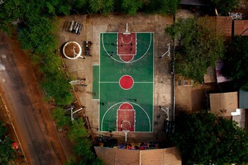Aerial view of a basketball court in a rural area