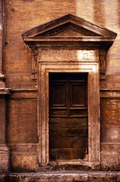 Door In Facade Of Historic Neoclassical Building In Central Rome, Italy