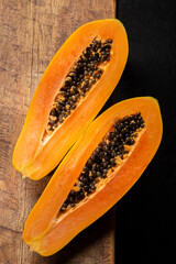 Papaya fruit on the table, top view