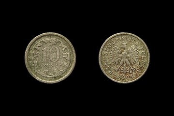 Closeup shot of Polish 10 grosz coins isolated on a black background - obrazy, fototapety, plakaty