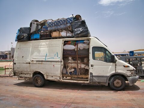 Overload cargo van on a ferry