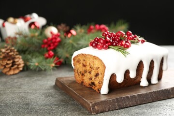 Traditional Christmas cake on grey table. Classic recipe