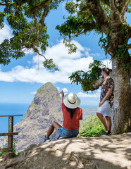 couple hiking in the mountains of Saint Lucia Caribbean, nature trail in the jungle of Saint Lucia...