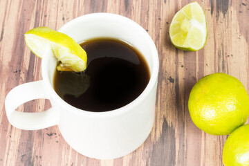agua de panela or sugar cane candy and lemon , typical food from Colombia
