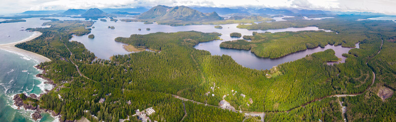 Aerial view over Tofino Pacific Rim national park with a drone from above Cox Bay Vancouver Island Canada. Sunset at long beach Tofino Vancouver Island © Fokke Baarssen