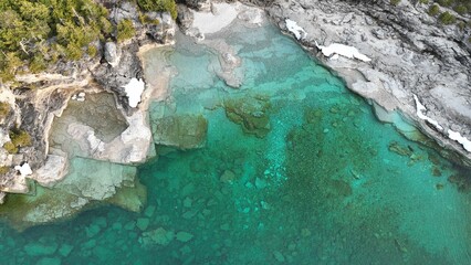 Bird's eye view of turquoise waters of Bruce Peninsula Park in Ontario, Canada