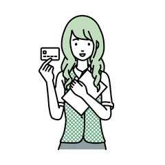 立って書類とカードを手に持つ事務員制服の女性