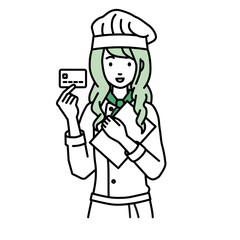 立って書類とカードを手に持つ調理師の女性