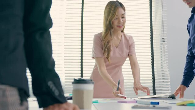 Group of young businessman and woman people work in office workplace.	
