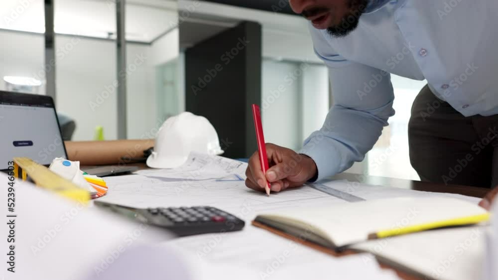 Poster professional male engineer doing a drawing for a project at his desk in his modern office. construct