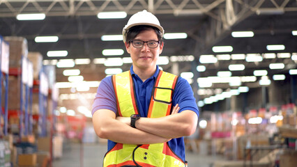 Professional industrial engineer wearing a white safety helmet before entering the construction site or working area. 