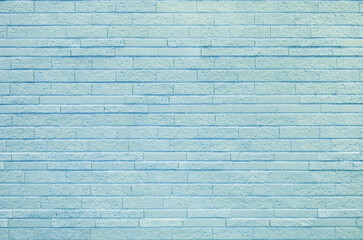 Turquoise blue brick tile wall texture background. Vintage and modern exterior or interior backdrop...