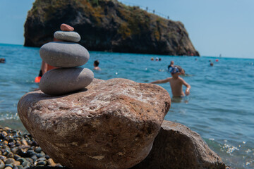 Stones pyramid sea meditation happy spa beach calm pebble travel, concept vacation tower in peace from summer landscape, abstract outdoor. Shore massage,