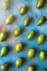 Avocados texture with blue vintage background