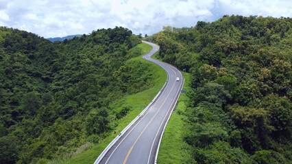 The road is similar to the number 3, This road is built on a mountain, past the forest in Nan...