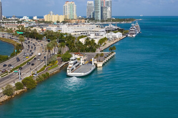 Ferry carrying vehicles to Fisher Island in Miami, Florida.