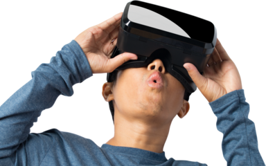 Young man using VR virtual reality headset.