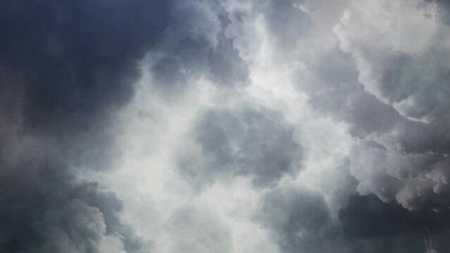 dark clouds and thunderstorm among cumulonimbus in the sky