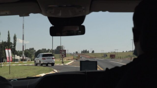 Driver's perspective as they go along the congested N4 Highway in South Africa in direction of Kruger National Park.
