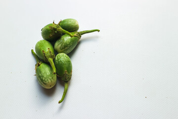 green eggplant on a wooden table