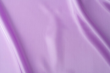 Fototapeta na wymiar Close up of purple silk background