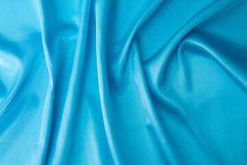 Close up of light blue silk background