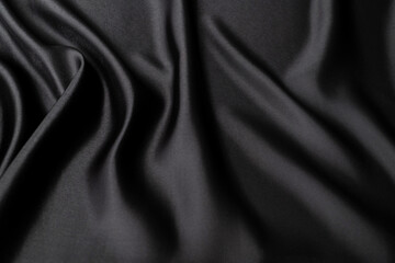 Close up of black silk background